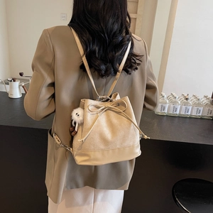 Fashionable khaki velvet bucket backpack with drawstring bow and cute plush pendant charm