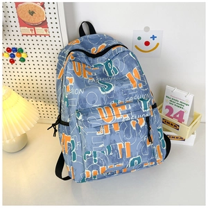 Close-up of lightweight blue graffiti backpack with fashion print and orange lettering