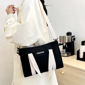 Grande borsa tote in tela bicolore con stampa FASHION e tracolla regolabile