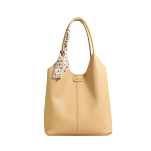 Minimalist yellow hobo bucket bag in lychee pattern leather with a plaid silk scarf handle