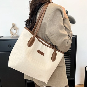Fashionable oversized houndstooth tote bag in cream and brown for college and daily commute