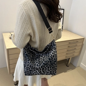 Fashionable leopard print tote bag with black wide shoulder strap for women