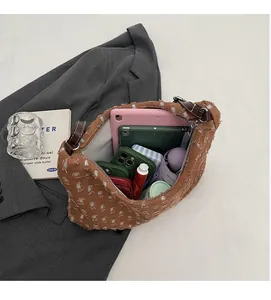 Top view of spacious brown canvas tote bag interior showing large storage capacity