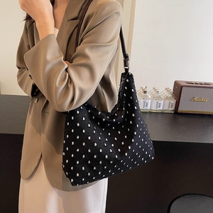 Polka dot hobo shoulder bag with leather strap and white textured dots for women