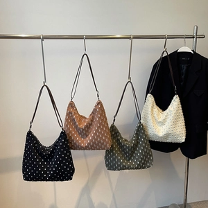Chic textured polka dot hobo tote bag with leather strap in four versatile colors