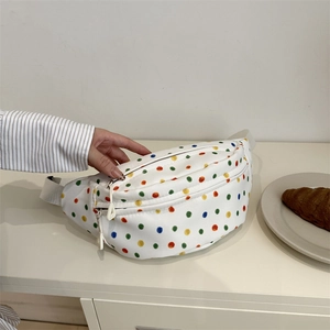 Polka dot canvas waist bag with colorful prints and adjustable white strap for women