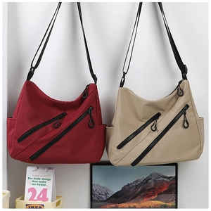 Dual-zipper large capacity crossbody bag in burgundy and beige with adjustable strap