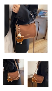 Brown moon-shaped crossbody bag shown in three-way carry styles with plush charm detail