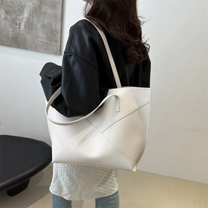 Minimalist white geometric tote bag in matte leather for women casual commuter style