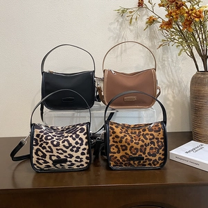 Minimalist vintage matte shoulder bags in black, brown, and leopard print nylon and faux fur