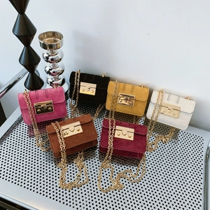Mini crossbody bags in six colors with matte suede texture and gold chain straps