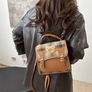 British style plaid backpack with plush bear patch and vintage buckle for casual wear