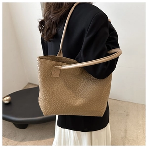 Detail of khaki woven texture and large capacity design on this fashion commuter tote bag