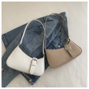 Minimalist faux leather baguette bags in white and beige with silver ring buckle detail