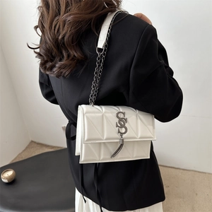 Quilted white leather crossbody bag with silver S-logo and metal chain strap
