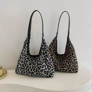 Large leopard print canvas tote bag for commuting with stylish faux leather shoulder straps