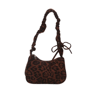 Chic leopard print hobo bag with ruched strap and bow detail for women in fall 2024