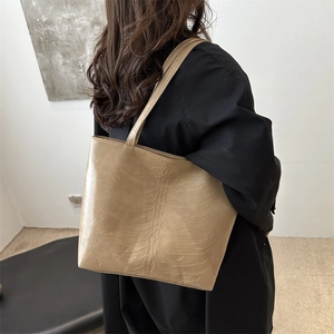 Retro large beige PU leather tote bag featuring unique rib bone texture design for women