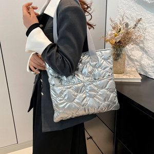 Silver quilted metallic puffer tote bag with large diamond stitching for women casual style