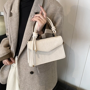 Beige knot handbag with floral lace embossing and woven rope handle for women