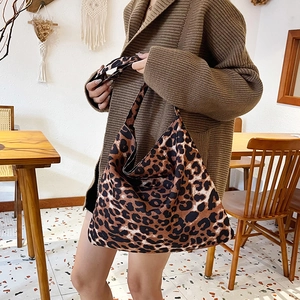 Stylish large leopard print canvas tote bag for women, perfect for casual daily shopping