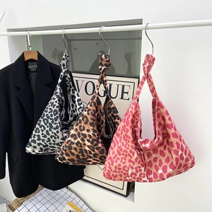 Large leopard print canvas tote bag with knotted handles in white, brown and pink