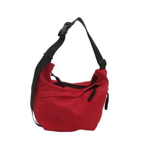 Red lightweight nylon crossbody dumpling bag with adjustable strap and casual sports style