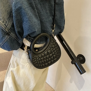 Quilted black PU leather crossbody bag with semi-circular silhouette and round handle