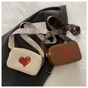 Chic cream and brown crossbody camera bags with red heart print and pattern straps