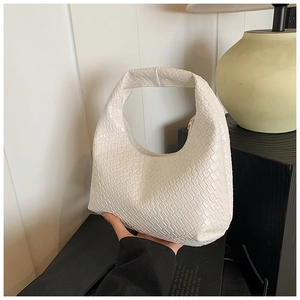Detail of white woven hobo bag with checkered texture and zipper closure for women