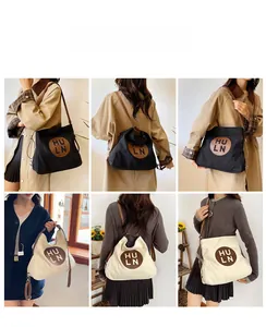 Multi-view of large canvas tote bags in black and beige with premium leather straps