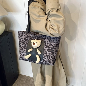 Large leopard print tote bag with plush bear charm, stylish casual shoulder bag for women