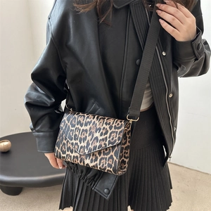 Chic leopard print crossbody bag with black wide strap and gold hardware accents