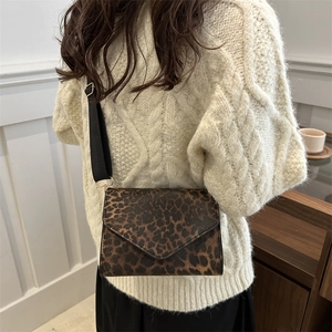 Chic leopard print crossbody bag with wide black strap for women's autumn fashion
