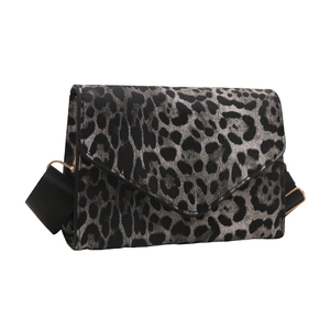 Chic leopard print crossbody bag with black wide strap and silver animal pattern finish