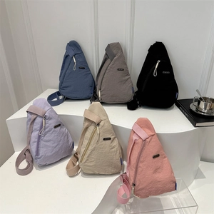 Minimalist lightweight nylon crossbody sling bags in six trendy solid colors for women