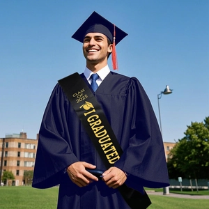 Detail of Class of 2025 graduation sash in black satin with gold printed lettering