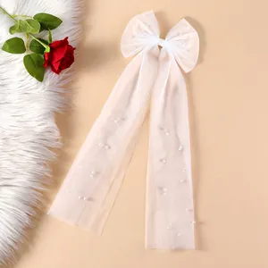Elegant white tulle bow hair ribbon with scattered pearls for bridal hair accessories