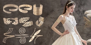 Detailed set of golden leaf and spiral arm cuffs with model wearing goddess style accessories
