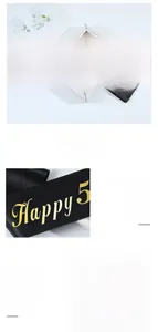 Close-up of black satin birthday sash with premium gold foil Happy 50th Birthday text