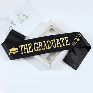 Elegant black satin graduation sash with gold THE GRADUATE lettering and icons