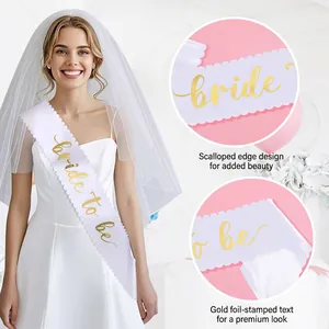 White Bride to Be sash with scalloped edges and gold foil lettering for wedding party