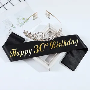 30th birthday set featuring a gold rhinestone crown and black Happy Birthday sash