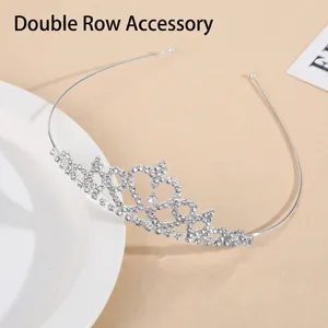 Elegant silver alloy crystal crown featuring a heart-shaped rhinestone and dangling pendant