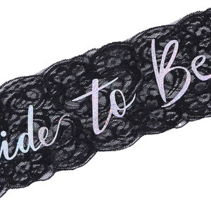 Black lace Bride To Be sash with holographic glitter lettering for bridal party events