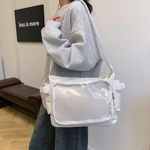 Japanese style white canvas crossbody bag with clear PVC mesh pocket on a model