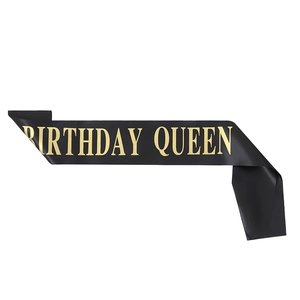 Elegant black satin Birthday Queen sash with metallic gold lettering for parties