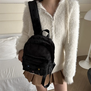 Cute black plush backpack with colorful button accents and adjustable straps for women
