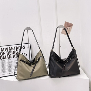 Minimalist nylon tote bags in khaki and black with metallic hardware for women