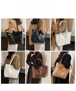 Detailed views of high-capacity leather tote bags in black, white, and caramel colors